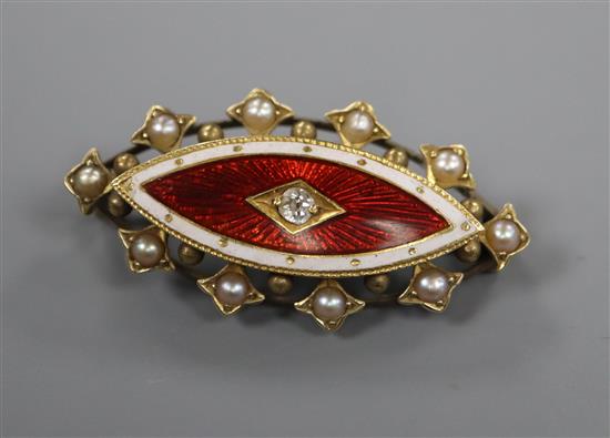 A late Victorian, yellow metal, enamel, diamond and seed pearl set elliptical brooch, 33mm.